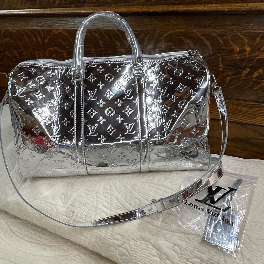 🔥🔥🔥 Designer monogram silver mirror color Duffel Bag.FIRM ( read description)